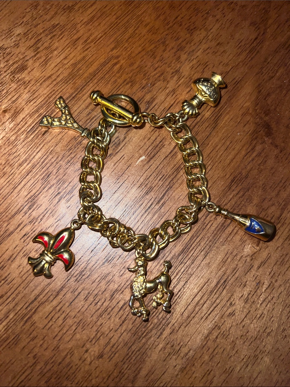 Gold french themed Charm Bracelet with Red & Blue Enamel Accents